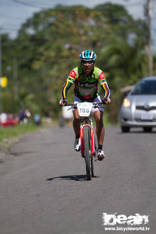 Santos Corea Gutierrez rides into the final external aid station during the final day of La ruta