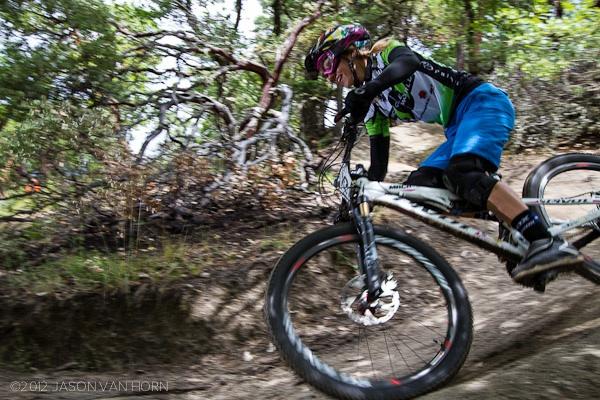 carolyn railing the hero dirt of a moist ashland enduro course