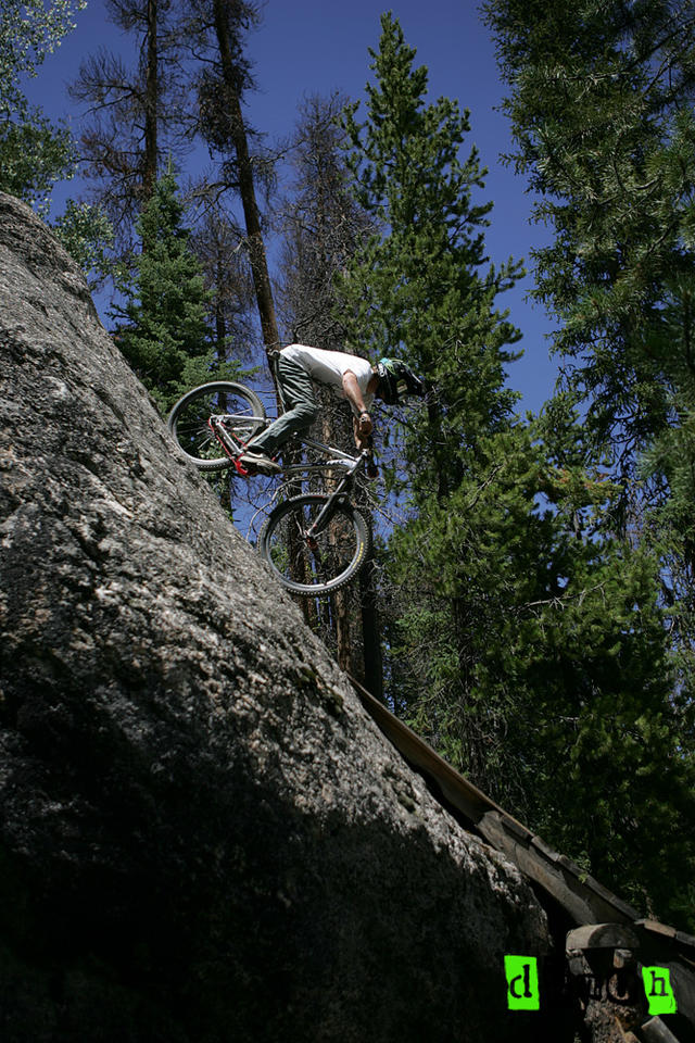 graham agassiz dropping into the cork screw from the rock at crank works colorado, winter park