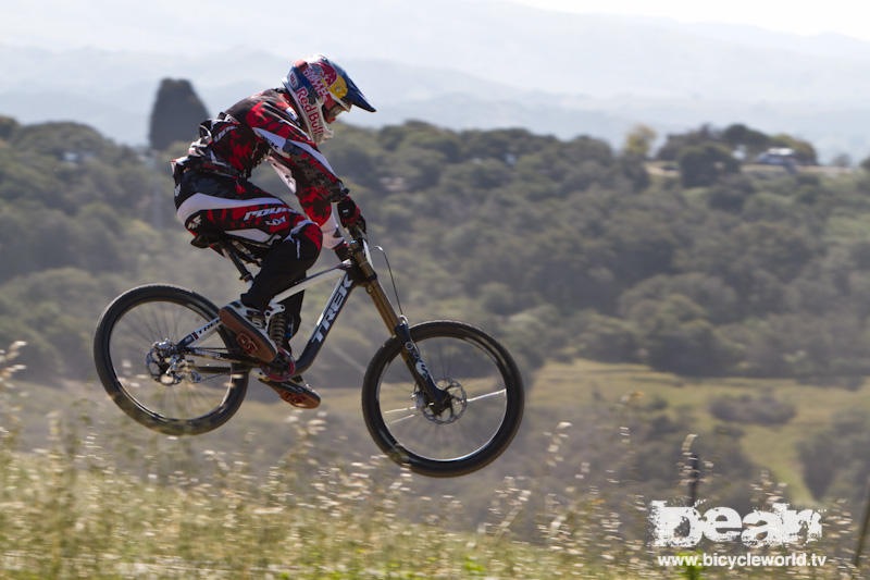 AAron Gwin riding downhill at the sea otter classic