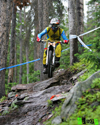 jason memmelaar bombing the rock section of the PRO GRT downhill